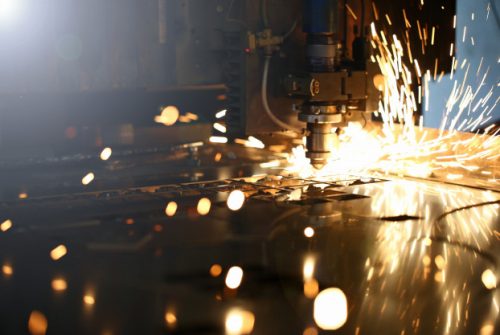 sparks-fly-out-machine-head-metal-processing_151013-1931